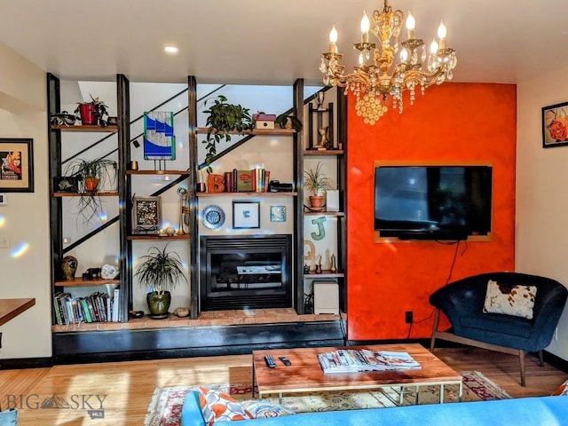 401 S Bozeman Ave, Bozeman, MT 59715 - living room featuring wood finished floors and a chandelier