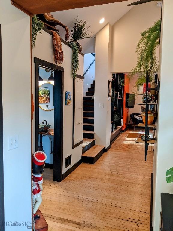 401 S Bozeman Ave, Bozeman, MT 59715 - corridor with stairs, light wood finished floors, and recessed lighting