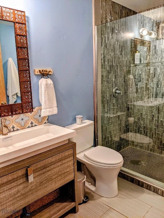 401 S Bozeman Ave, Bozeman, MT 59715 - bathroom featuring a walk in shower and vanity