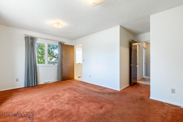 117 Henderson St, Bozeman, MT 59715 - unfurnished bedroom with carpet floors and a textured ceiling