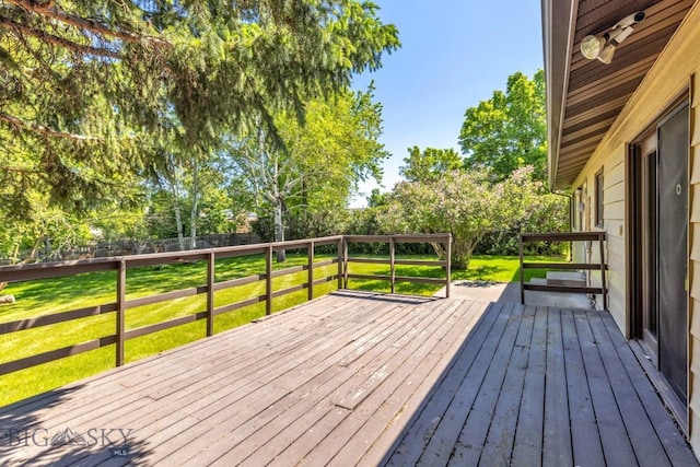 117 Henderson St, Bozeman, MT 59715 - deck featuring view of wooded area