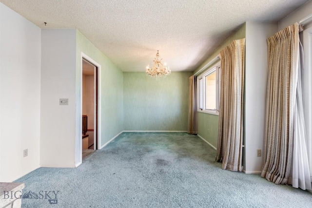 117 Henderson St, Bozeman, MT 59715 - carpeted spare room with a chandelier and a textured ceiling