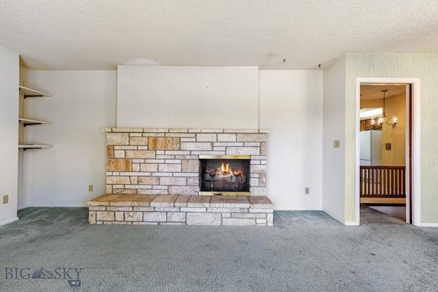 117 Henderson St, Bozeman, MT 59715 - unfurnished living room with carpet floors, a textured ceiling, and a fireplace