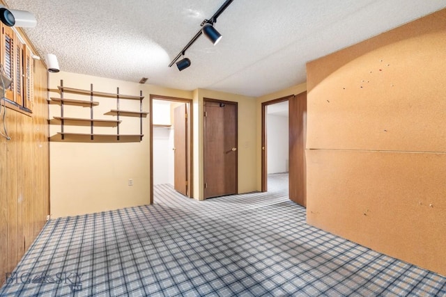 117 Henderson St, Bozeman, MT 59715 - empty room featuring carpet floors and a textured ceiling
