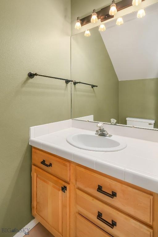 104 S Yellowstone Ave Unit 1, Bozeman, MT 59718 - half bath with vanity and vaulted ceiling