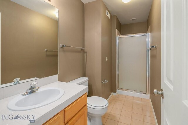 104 S Yellowstone Ave Unit 1, Bozeman, MT 59718 - full bathroom featuring vanity, a stall shower, and tile patterned floors