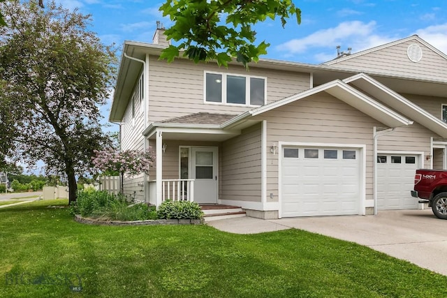 104 S Yellowstone Ave Unit 1, Bozeman, MT 59718 - view of front of house with a front yard, concrete driveway, and a chimney