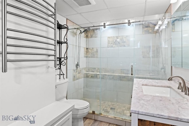 3573 Spain Bridge Rd, Belgrade, MT 59714 - bathroom with vanity, a stall shower, and wood finished floors