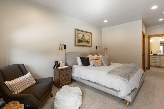 35A Heavy Runner Rd Unit 35A, Big Sky, MT 59716 - bedroom featuring light colored carpet, recessed lighting, and connected bathroom