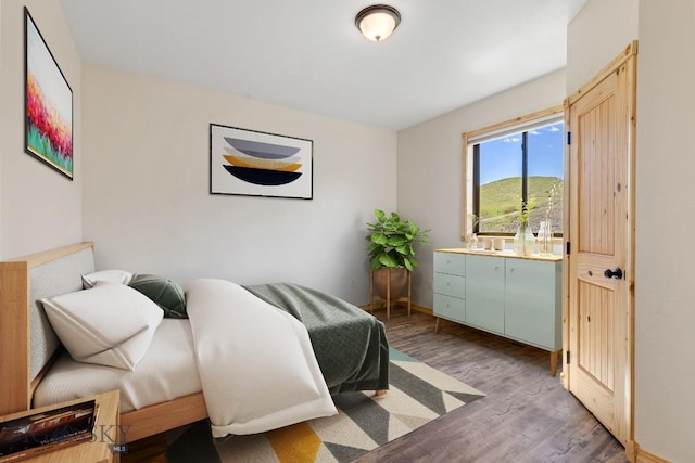 730 US Highway 10 W, Livingston, MT 59047 - bedroom featuring wood finished floors and baseboards