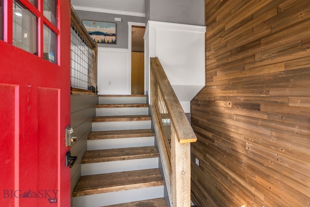 24151 Frontage Rd, Bozeman, MT 59718 - stairs with wooden walls and crown molding