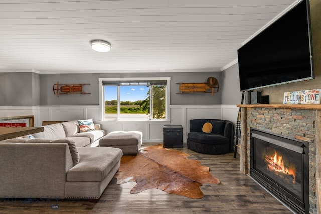 24151 Frontage Rd, Bozeman, MT 59718 - living area featuring a fireplace, crown molding, wainscoting, and wood finished floors