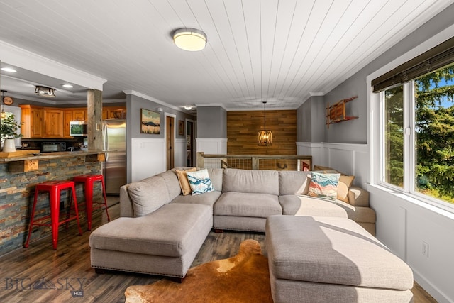 24151 Frontage Rd, Bozeman, MT 59718 - living room with plenty of natural light, crown molding, a wainscoted wall, wood finished floors, and recessed lighting