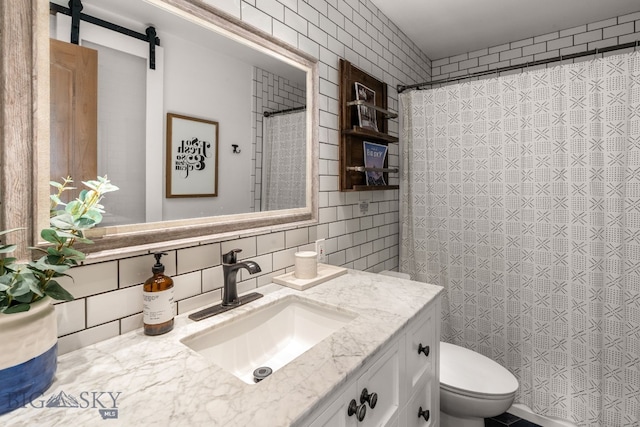 24151 Frontage Rd, Bozeman, MT 59718 - bathroom featuring tile walls, vanity, tasteful backsplash, and a shower with shower curtain