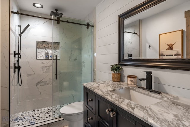 24151 Frontage Rd, Bozeman, MT 59718 - bathroom featuring vanity, a marble finish shower, and recessed lighting