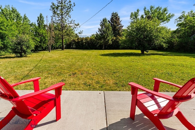 24151 Frontage Rd, Bozeman, MT 59718 - view of grassy yard featuring a patio area