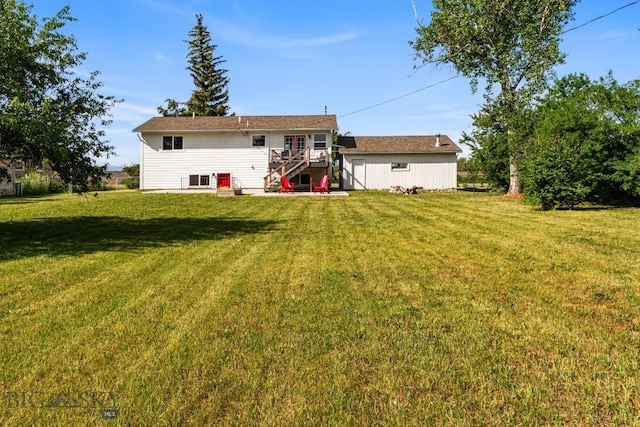 24151 Frontage Rd, Bozeman, MT 59718 - back of house featuring stairway, a deck, and a yard