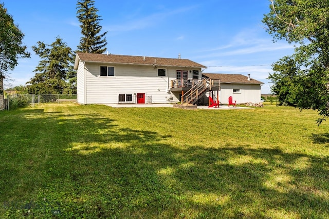 24151 Frontage Rd, Bozeman, MT 59718 - rear view of house featuring stairway and a wooden deck