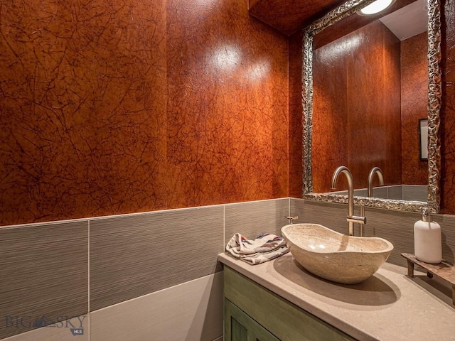 1255 Andesite Rd, Big Sky, MT 59716 - bathroom with vanity and a wainscoted wall