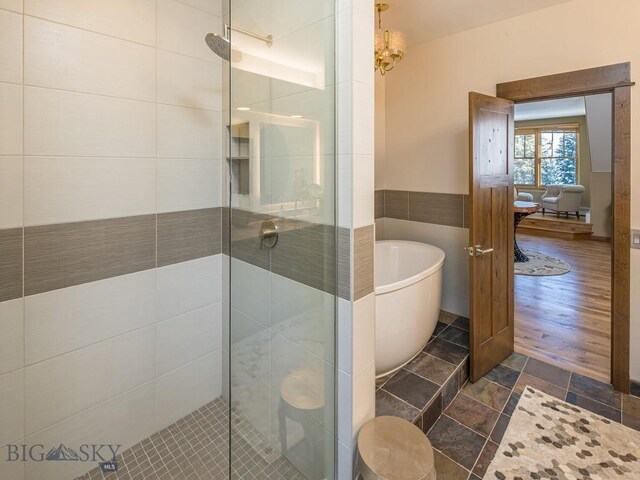 1255 Andesite Rd, Big Sky, MT 59716 - bathroom with a stall shower and a freestanding bath