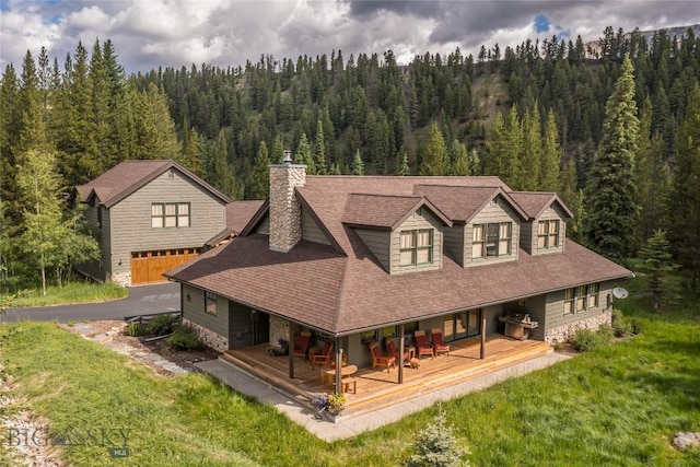 1255 Andesite Rd, Big Sky, MT 59716 - view from above of property featuring a heavily wooded area
