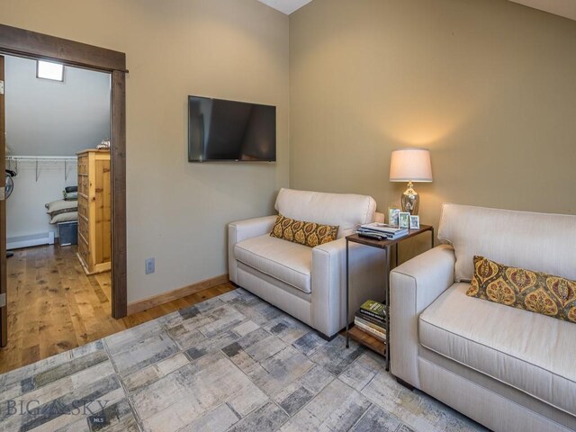 1255 Andesite Rd, Big Sky, MT 59716 - living area with baseboards and wood finished floors