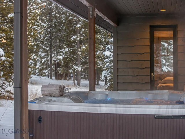 1255 Andesite Rd, Big Sky, MT 59716 - bathroom featuring plenty of natural light and wooden ceiling