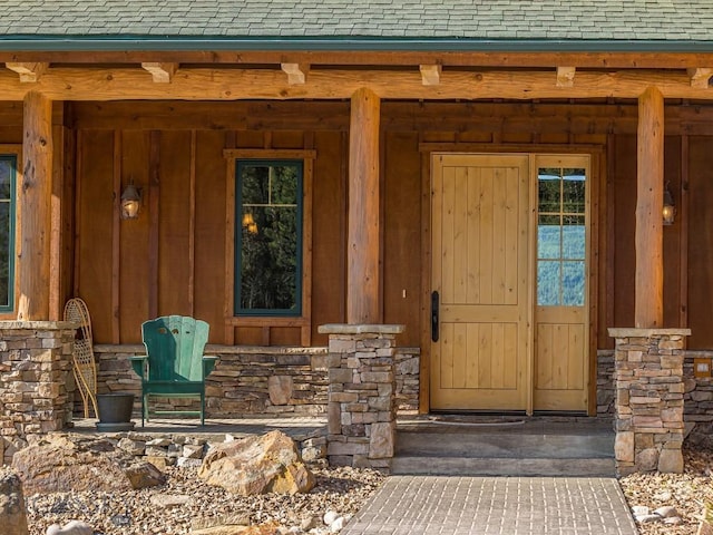 725 Sandhill Rd, Big Sky, MT 59716 - entrance to property with roof with shingles