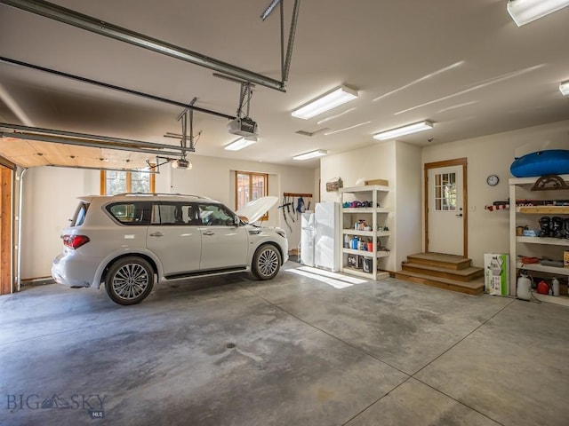 725 Sandhill Rd, Big Sky, MT 59716 - garage with a garage door opener