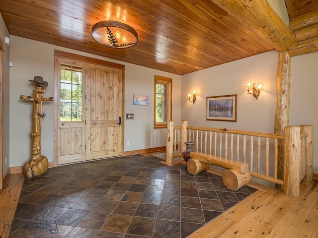 725 Sandhill Rd, Big Sky, MT 59716 - foyer with plenty of natural light and wooden ceiling