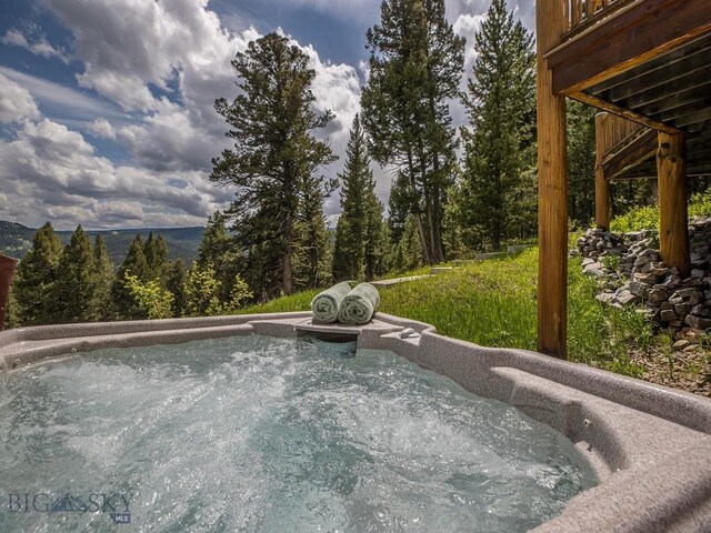 725 Sandhill Rd, Big Sky, MT 59716 - view of pool featuring a hot tub