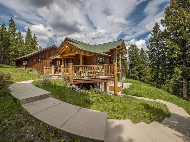 725 Sandhill Rd, Big Sky, MT 59716 - view of front of house with board and batten siding