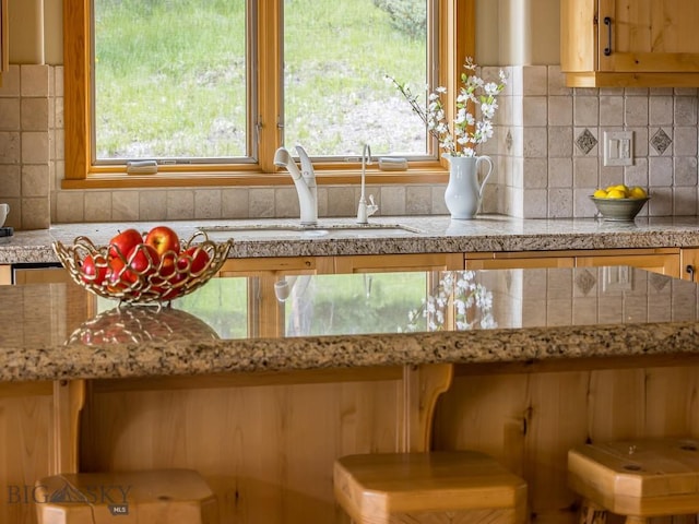 725 Sandhill Rd, Big Sky, MT 59716 - kitchen view of light countertops and decorative backsplash