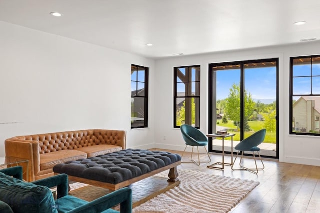 557 St Andrews, Bozeman, MT 59715 - living area featuring hardwood / wood-style flooring and recessed lighting