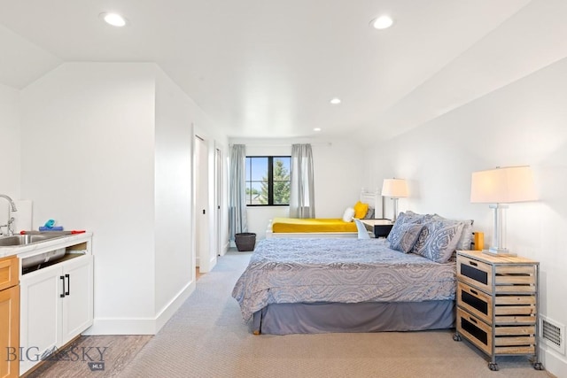557 St Andrews, Bozeman, MT 59715 - bedroom with recessed lighting, light colored carpet, and lofted ceiling