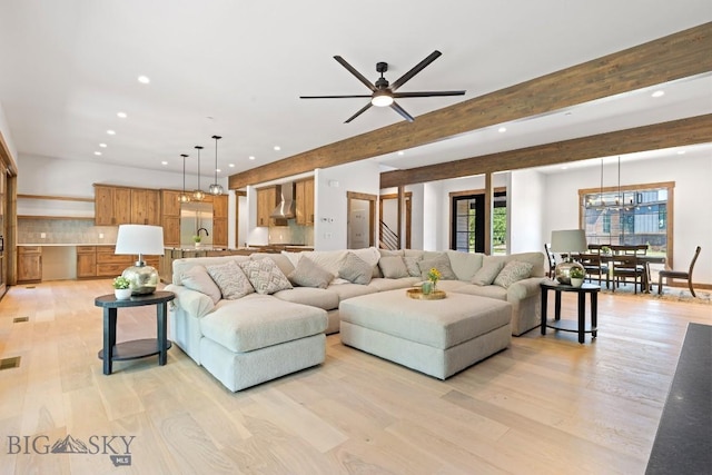 33 Leachman Ln, Bozeman, MT 59718 - living area featuring recessed lighting, light wood-style flooring, ceiling fan, stairway, and beam ceiling