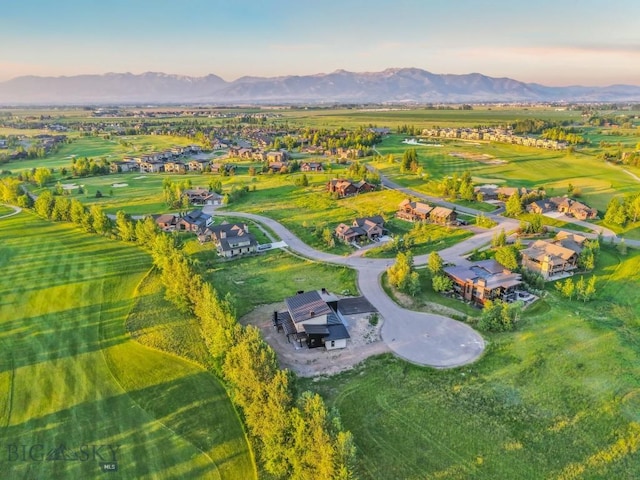 33 Leachman Ln, Bozeman, MT 59718 - aerial view at dusk of a mountain view and a residential view
