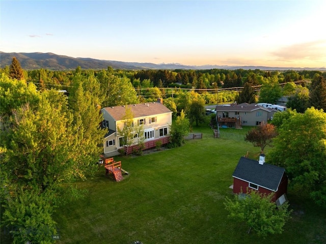 8373 Goldenstein Ln, Bozeman, MT 59715 - view of subject property featuring a heavily wooded area and a mountainous background