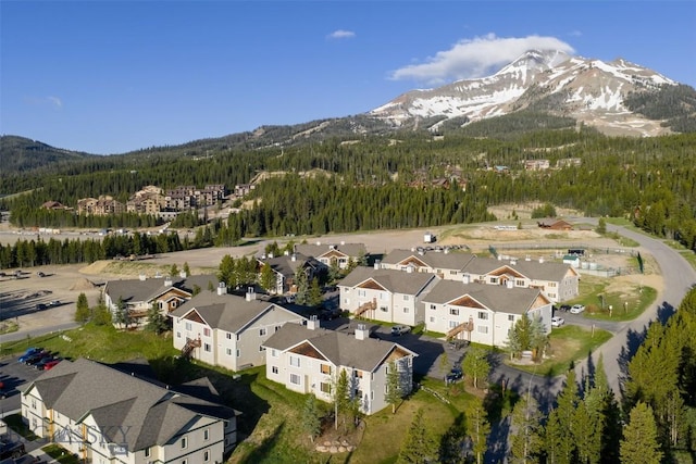 13 Moose Ridge Rd, Big Sky, MT 59716 - aerial view of property and surrounding area with nearby suburban area