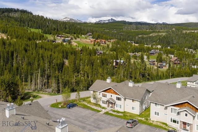 13 Moose Ridge Rd, Big Sky, MT 59716 - aerial view of a forest and mountains