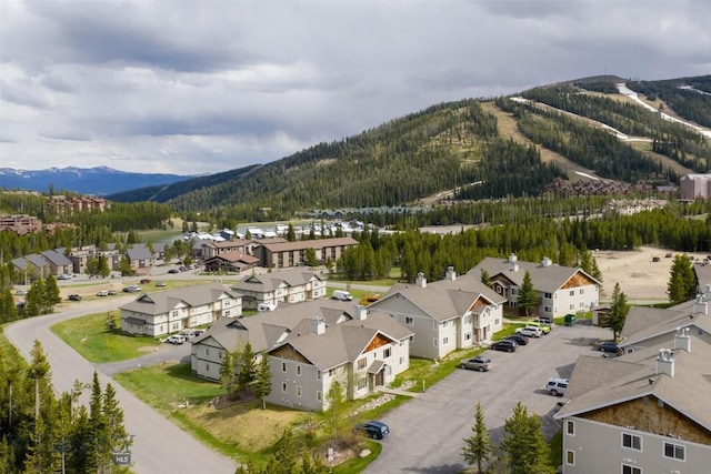13 Moose Ridge Rd, Big Sky, MT 59716 - aerial perspective of suburban area with mountains