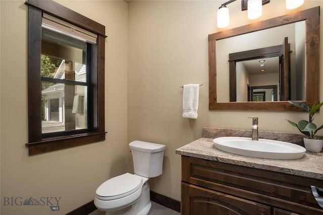 13011 Cottonwood Canyon Rd, Bozeman, MT 59718 - half bathroom featuring vanity and toilet