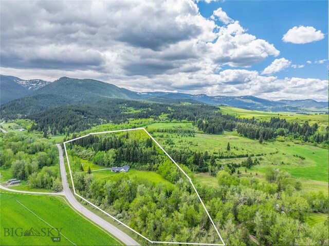 13011 Cottonwood Canyon Rd, Bozeman, MT 59718 - aerial view of property's location featuring property boundaries highlighted and a mountainous background