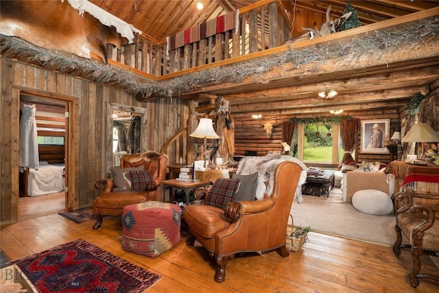 13011 Cottonwood Canyon Rd, Bozeman, MT 59718 - sitting room featuring high vaulted ceiling and wood-type flooring