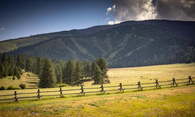 8337 Lamar Trl, Lolo, MT 59847 - view of mountain backdrop with rural landscape