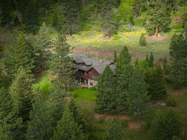 8337 Lamar Trl, Lolo, MT 59847 - view from above of property with a heavily wooded area