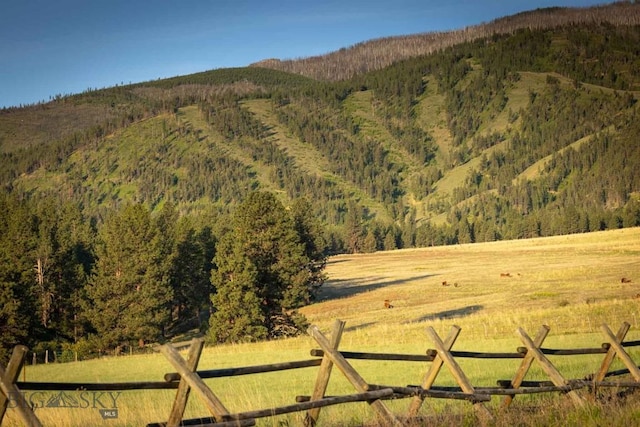 8337 Lamar Trl, Lolo, MT 59847 - mountain view featuring a heavily wooded area