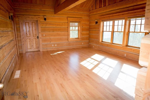 8337 Lamar Trl, Lolo, MT 59847 - unfurnished room with wooden walls and wood finished floors