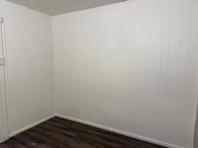 308 E 4th St, Anaconda, MT 59711 - unfurnished room with dark wood-style flooring and baseboards