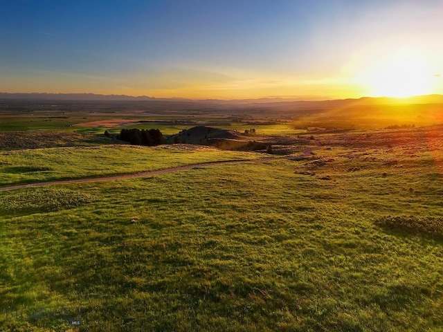 FourBarRanches Corbly Gulch, Belgrade, MT 59714 - aerial view at dusk of a mountain view and a view of rural / pastoral area
